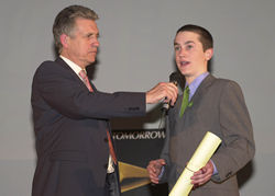 Oli accepting the PricewaterhouseCoopers Leaders of Tomorrow Award